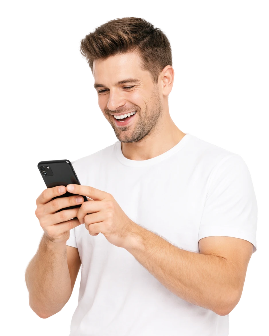 Smiling young man in a white T-shirt using his phone