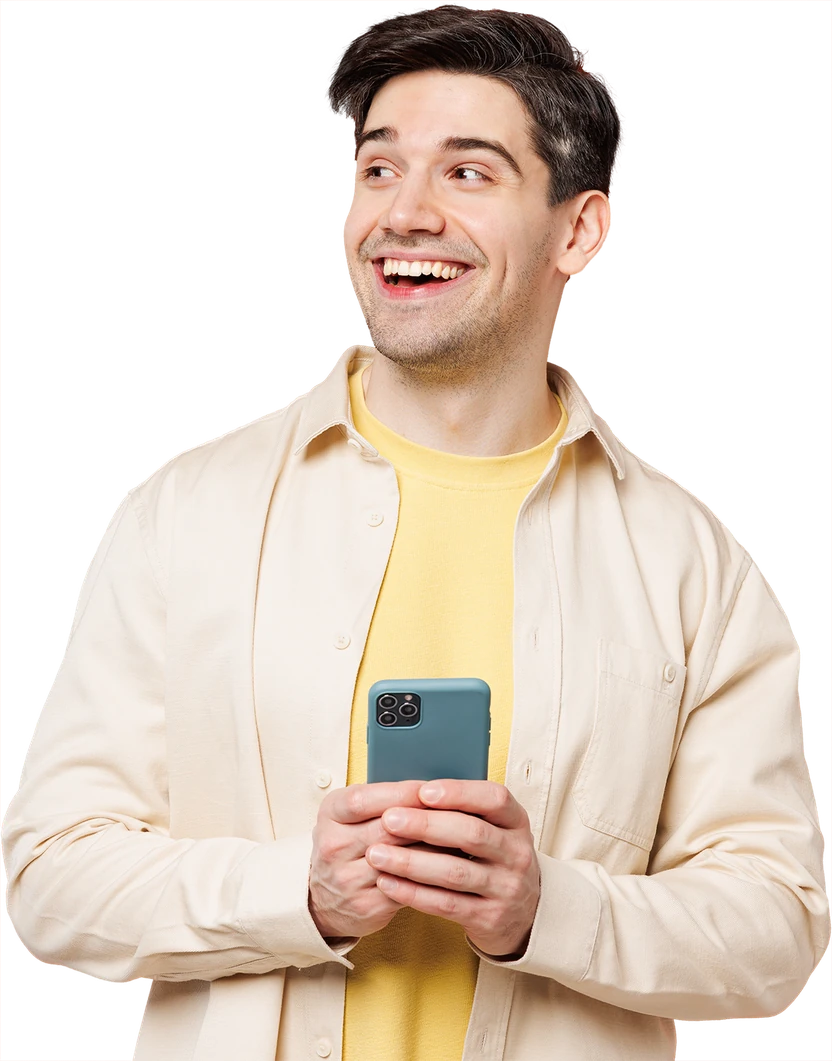 Smiling man holding his phone